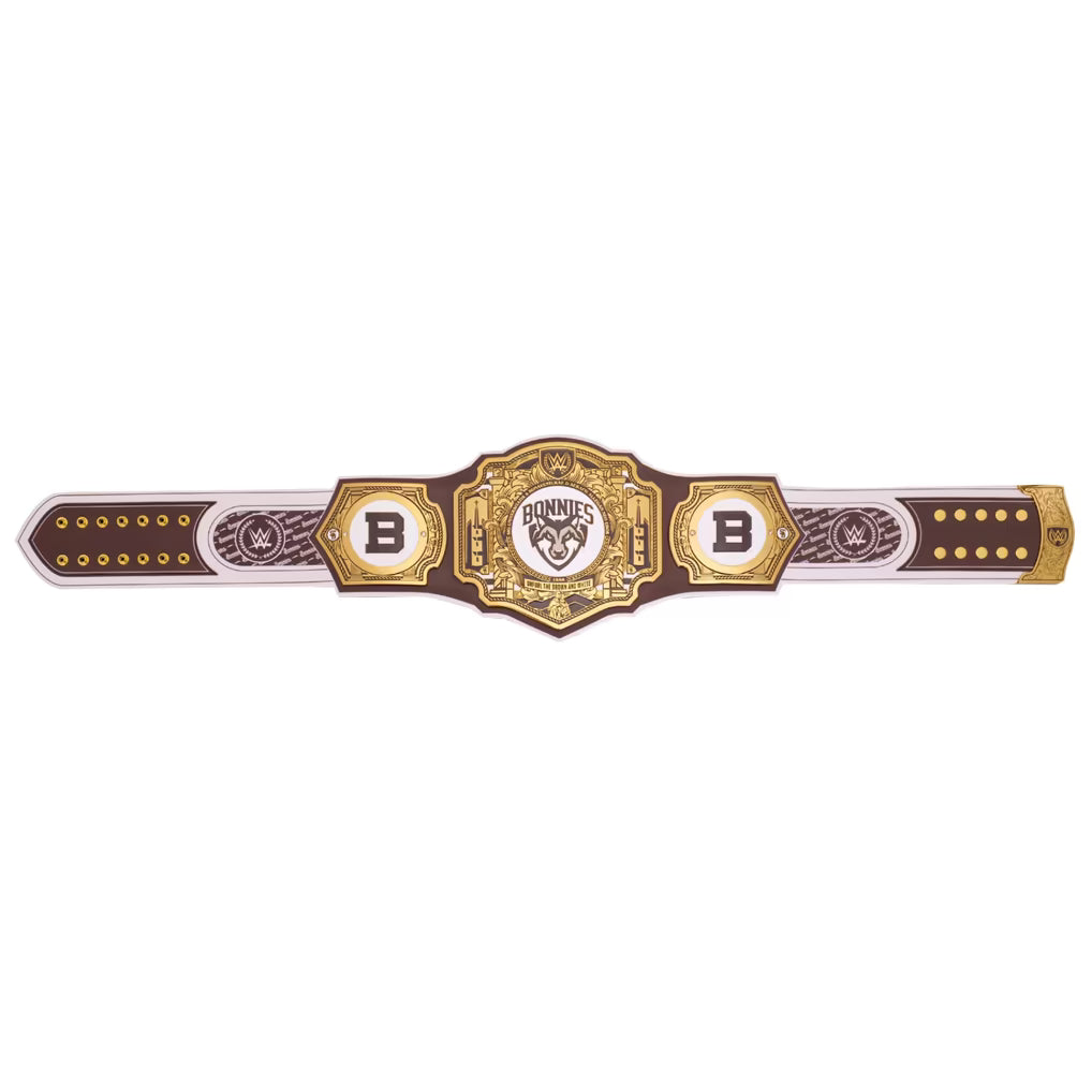 A replica or costume championship belt featuring a central gold and white plaque with a ram logo reading 'BURNOUT CHAMPION', flanked by two gold 'B' medallions and dark brown leather straps with gold studs.
