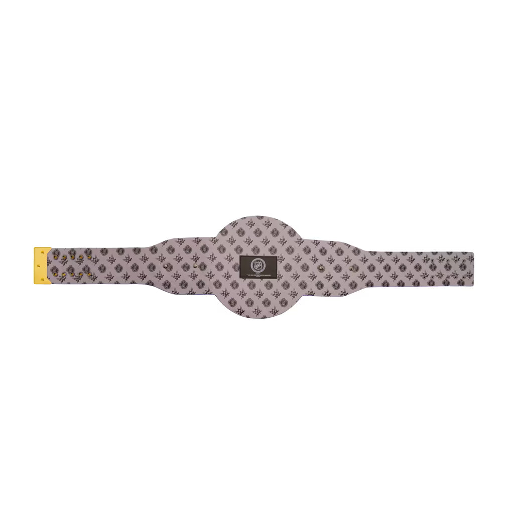 A horizontal stretch strap with a gray and black geometric pattern, featuring a central circular section, a yellow connector on the left, and a black brand patch in the middle.