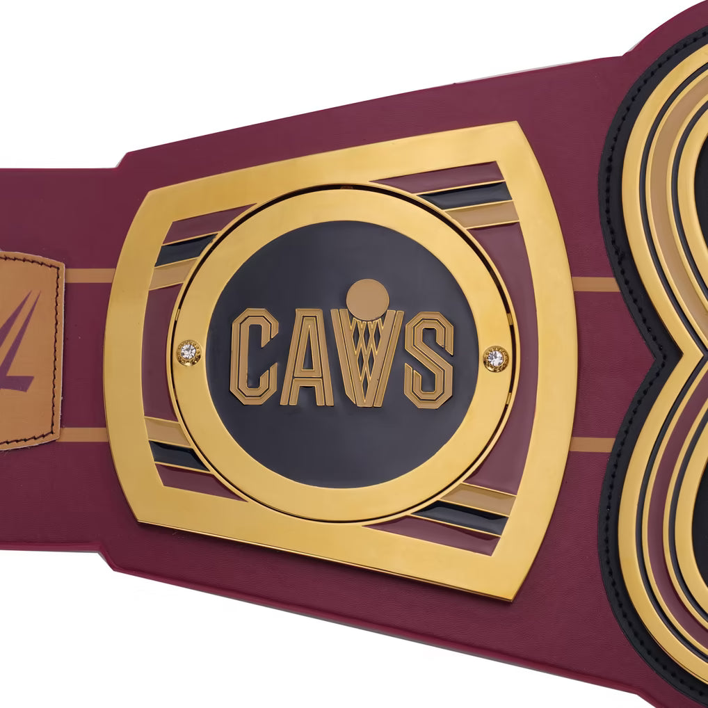 Maroon and gold championship belt with 'CAVS' logo on a white background