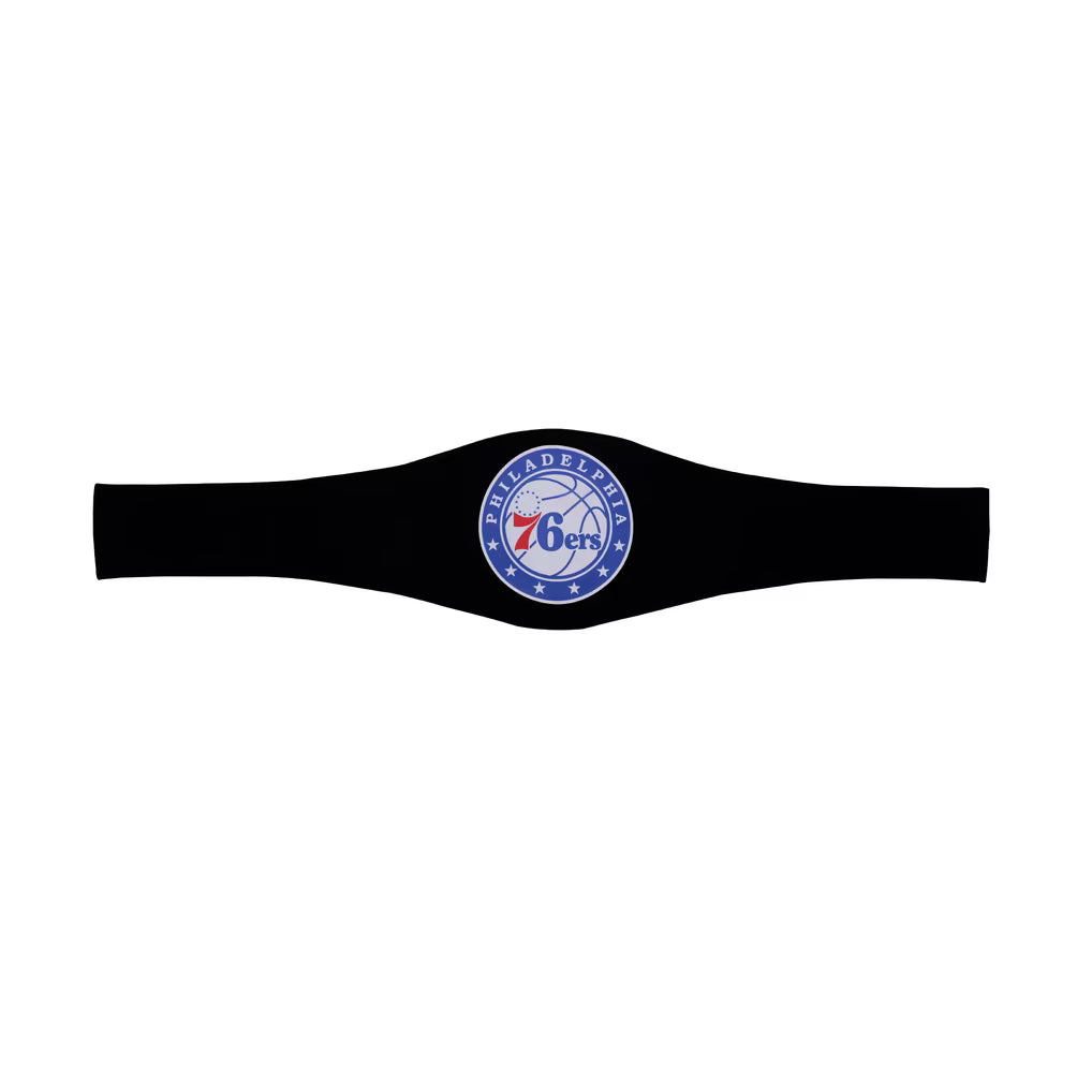 A black athletic headband featuring the Philadelphia 76ers circular logo in blue, white, and red, displayed against a solid white background.