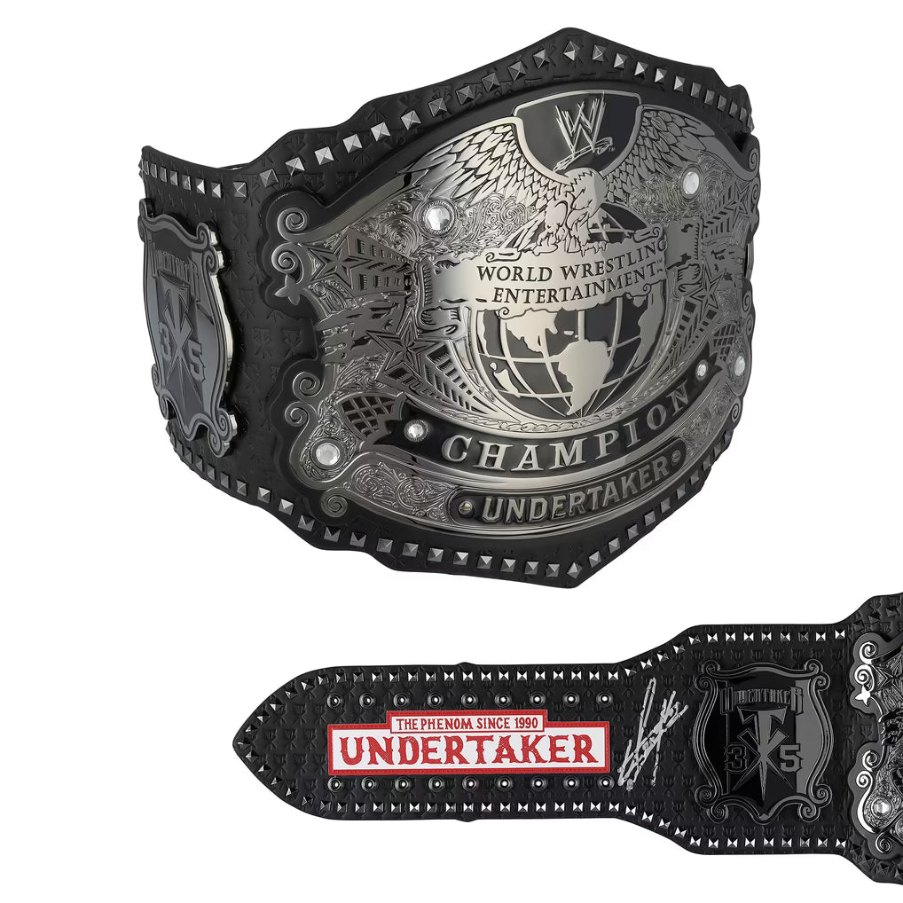 Wrestling championship belt shown from the front and back on a white background. The belt features a large central plate with the WWE logo and the words 'World Wrestling Entertainment Champion Undertaker,' with additional engraved details and a red-and-white 'Undertaker' nameplate visible on the keeper.