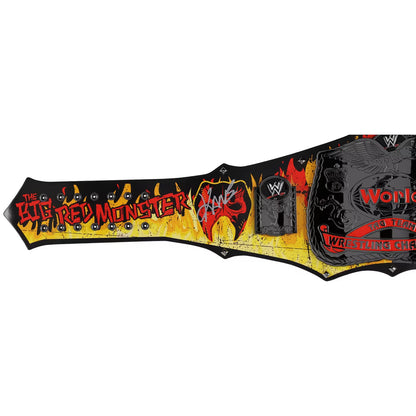 Wrestling championship belt with colorful design and text on a white background