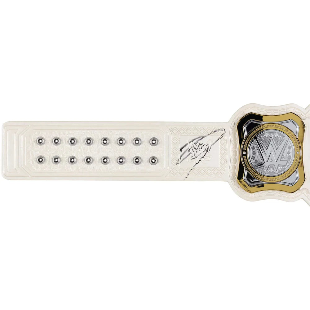 A WWE Championship replica wristlet featuring an off-white strap with silver studs, a silver WWE logo medallion, and gold and black accents on the buckle, shown against a plain white background.