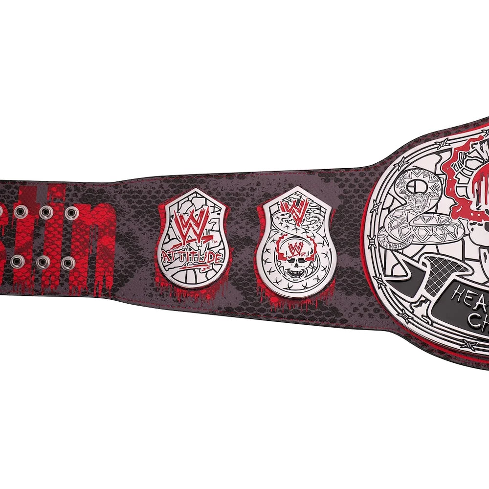 Wrestling championship belt with red and black design on a white background