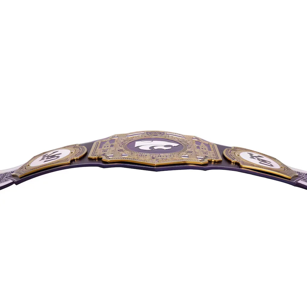 A championship-style belt with a dark purple strap and ornate gold-toned metal plates, featuring a central purple and white logo and side 'KS' emblems, photographed on a plain white background.
