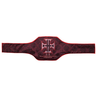 A Triple Crown World Heavyweight Championship belt in dark red with a black patterned background, featuring a silver and red Roman numeral XIII and the Triple Crown logo in the center.