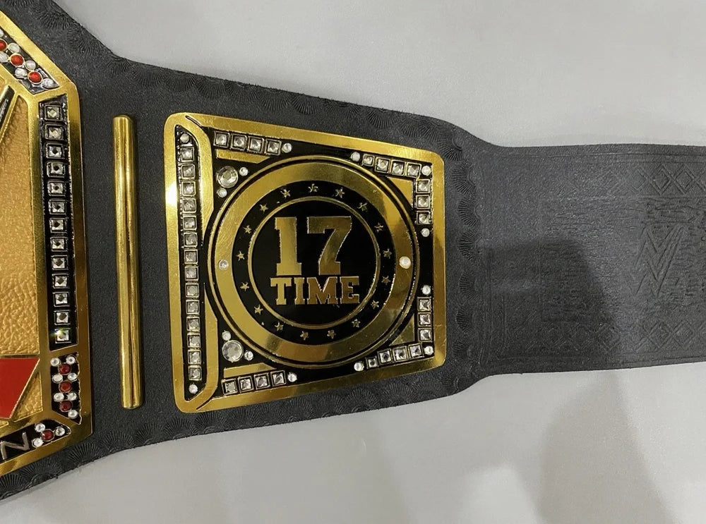 Wrestling championship belt with '17 Time' engraving on a white background