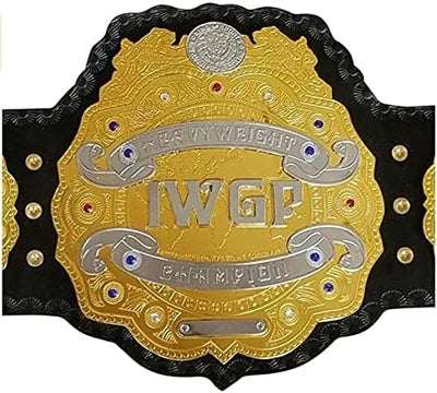 A heavyweight championship belt with a large ornate gold center plate, silver lettering reading 'IWGP Champion,' black strap edges, and small blue and red gem accents on a plain white background.