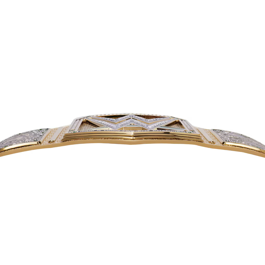 Close-up of a gold championship-style belt buckle with a geometric star design, set against a plain white background.