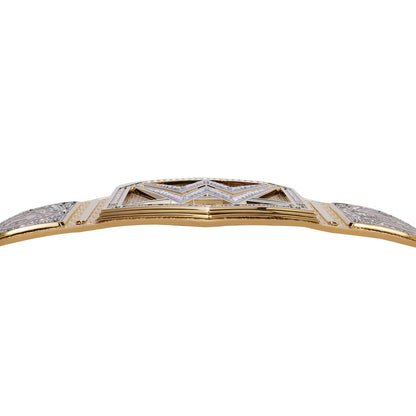 Close-up of a gold championship-style belt buckle with a geometric star design, set against a plain white background.