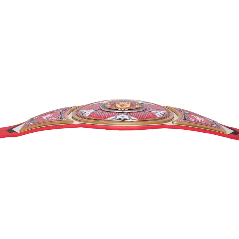 A red and gold championship belt with silver and white details, photographed against a solid white background.