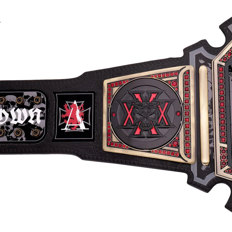 Black championship belt with red and gold accents on a white background