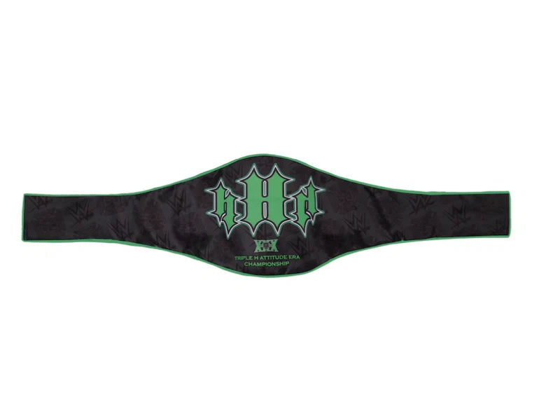 Black belt with green logo on a white background