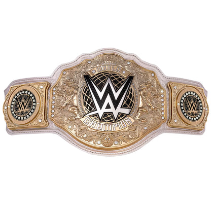WWE Championship belt featuring a large central plate with the WWE logo, flanked by two smaller circular medallions, on a white and gold ornate strap against a plain white background.